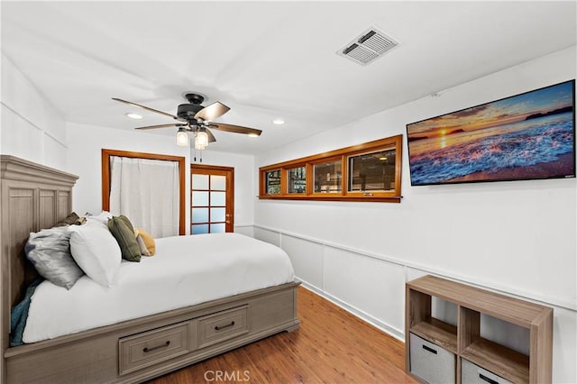 31342 Silverado Canyon Rd, Silverado Canyon, CA 92676 - bedroom with recessed lighting, a wainscoted wall, and light wood-style flooring