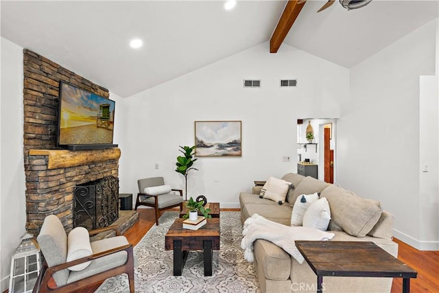 31342 Silverado Canyon Rd, Silverado Canyon, CA 92676 - living area featuring wood finished floors, baseboards, beamed ceiling, a fireplace, and high vaulted ceiling