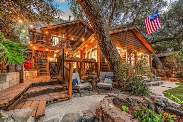 31342 Silverado Canyon Rd, Silverado Canyon, CA 92676 - back of property with a balcony, a wooden deck, and a patio
