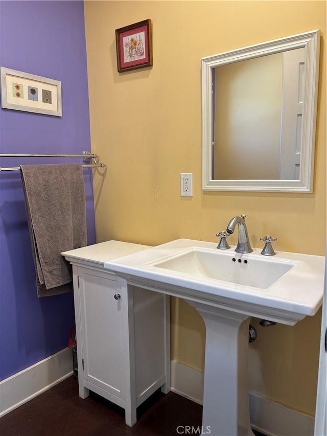 163 S Kingsley, Los Angeles, CA 90004 - bathroom featuring baseboards and a sink