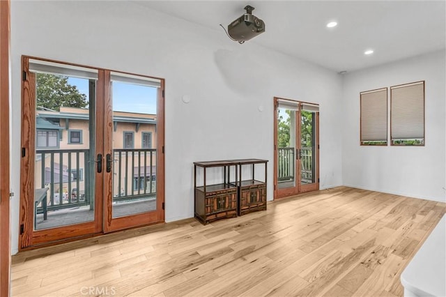 163 S Kingsley, Los Angeles, CA 90004 - unfurnished living room featuring wood finished floors, french doors, recessed lighting, and baseboards