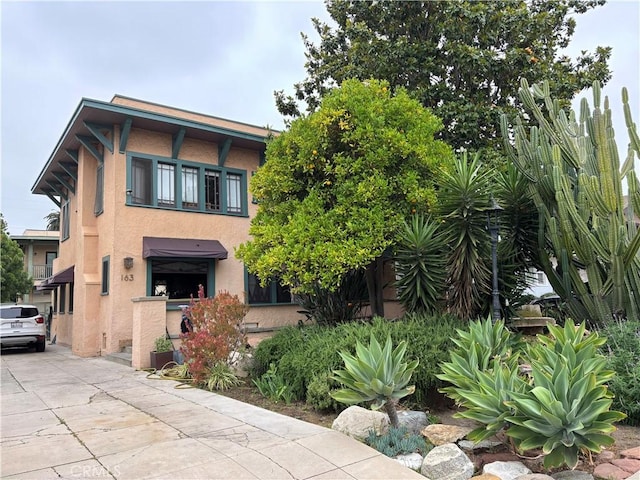 163 S Kingsley, Los Angeles, CA 90004 - view of front of property featuring stucco siding and driveway