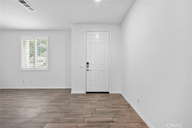 6864 Ripple Ct, Jurupa Valley, CA 91752 - spare room featuring wood finished floors and baseboards