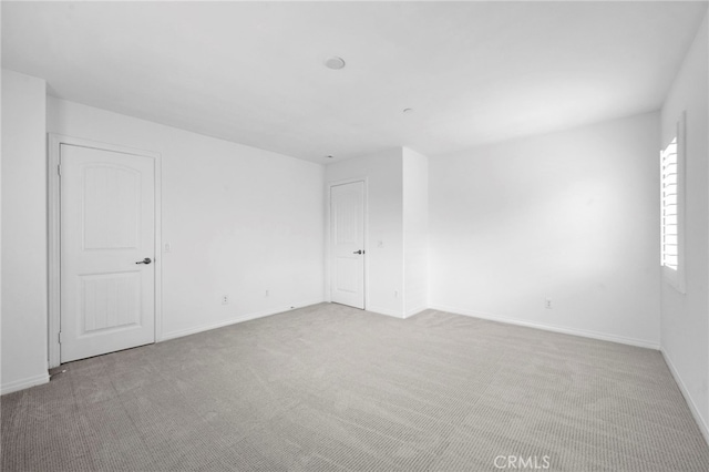 6864 Ripple Ct, Jurupa Valley, CA 91752 - carpeted spare room featuring baseboards