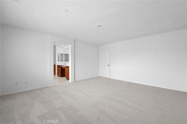 6864 Ripple Ct, Jurupa Valley, CA 91752 - spare room featuring light carpet and baseboards