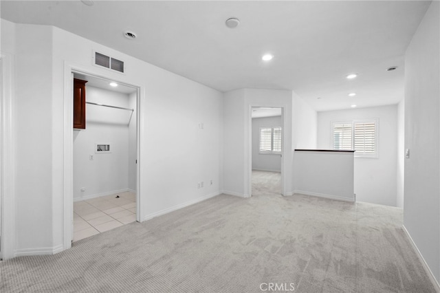 6864 Ripple Ct, Jurupa Valley, CA 91752 - spare room featuring light carpet, recessed lighting, and baseboards