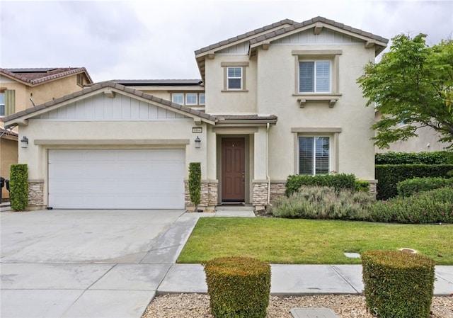 6864 Ripple Ct, Jurupa Valley, CA 91752 - view of front of property featuring stone siding, a front lawn, a tiled roof, and driveway