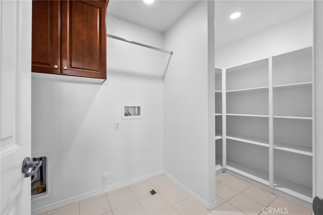6864 Ripple Ct, Jurupa Valley, CA 91752 - laundry area with cabinet space, hookup for a washing machine, baseboards, light tile patterned flooring, and recessed lighting
