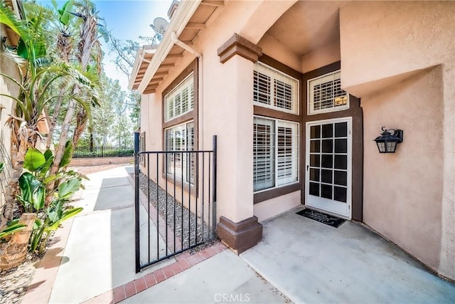 11015 Charleston St, Rancho Cucamonga, CA 91701 - view of exterior entry featuring stucco siding and a patio area