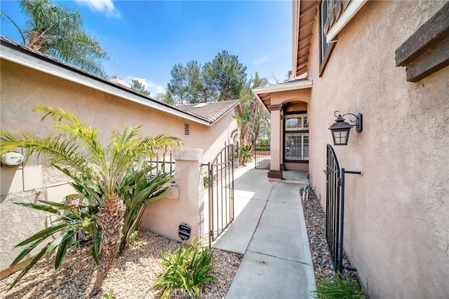 11015 Charleston St, Rancho Cucamonga, CA 91701 - doorway to property featuring a gate and stucco siding