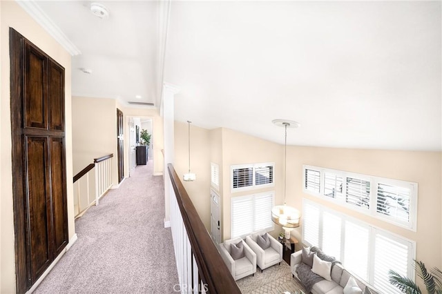 11015 Charleston St, Rancho Cucamonga, CA 91701 - corridor with light colored carpet, an upstairs landing, healthy amount of natural light, and crown molding