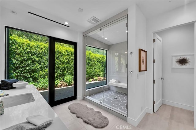 25057 Lewis And Clark Rd, Hidden Hills, CA 91302 - full bathroom with a stall shower, tile patterned flooring, double vanity, baseboards, and lofted ceiling