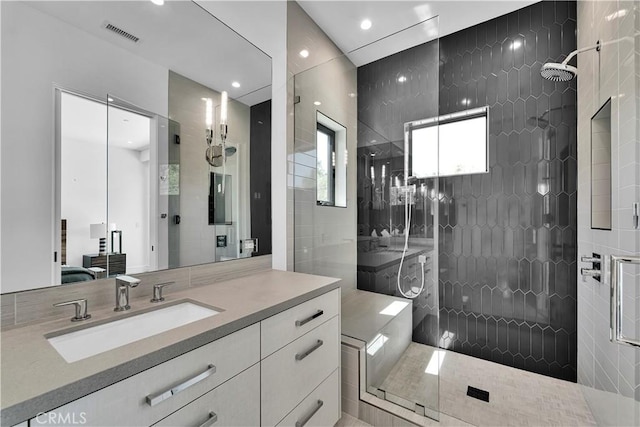 25057 Lewis And Clark Rd, Hidden Hills, CA 91302 - bathroom featuring vanity, a walk in shower, and recessed lighting