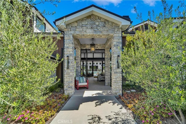 25057 Lewis And Clark Rd, Hidden Hills, CA 91302 - doorway to property featuring stone siding and a porch