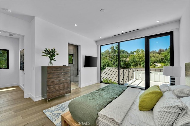 25057 Lewis And Clark Rd, Hidden Hills, CA 91302 - bedroom with access to exterior, light wood-type flooring, baseboards, and recessed lighting