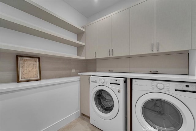 25057 Lewis And Clark Rd, Hidden Hills, CA 91302 - washroom with washing machine and dryer and cabinet space
