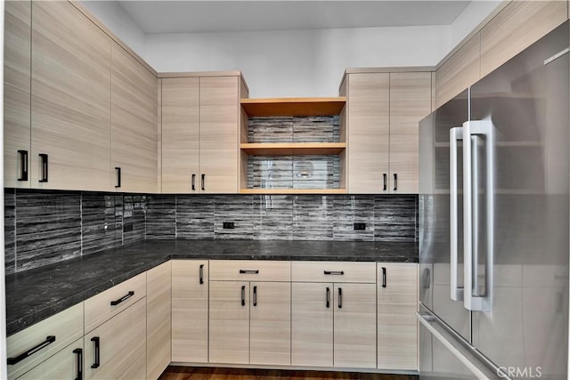 25057 Lewis And Clark Rd, Hidden Hills, CA 91302 - kitchen featuring high end fridge, light brown cabinets, open shelves, decorative backsplash, and dark stone countertops