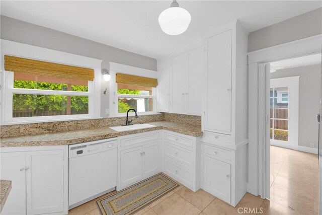 310 Hermosa, Long Beach, CA 90802 - kitchen with white dishwasher, white cabinetry, and light tile patterned floors