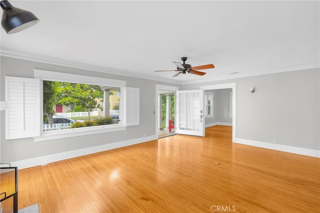 310 Hermosa, Long Beach, CA 90802 - unfurnished living room with crown molding, ceiling fan, wood finished floors, and baseboards