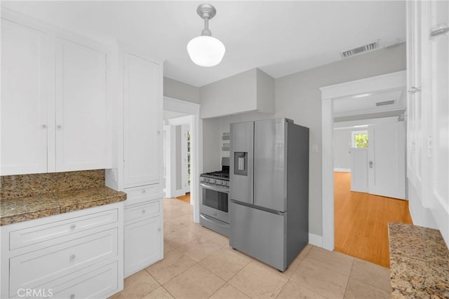 310 Hermosa, Long Beach, CA 90802 - kitchen featuring stainless steel appliances, white cabinetry, baseboards, and light tile patterned flooring