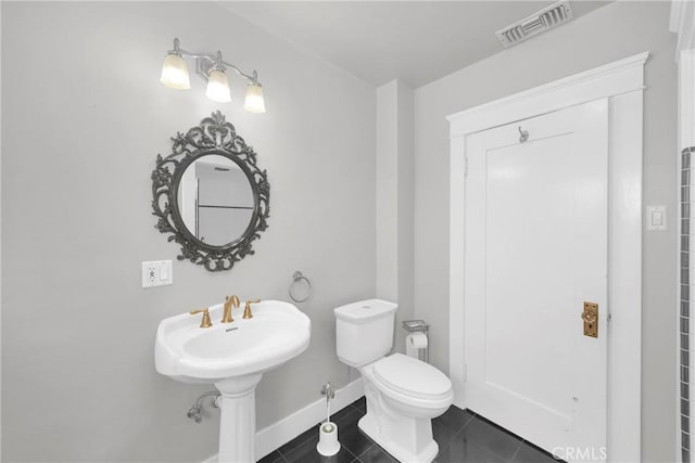 310 Hermosa, Long Beach, CA 90802 - bathroom featuring baseboards, toilet, and tile patterned floors