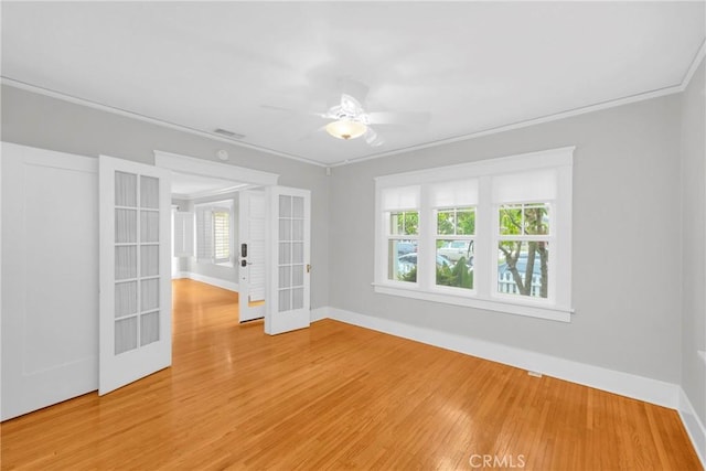 310 Hermosa, Long Beach, CA 90802 - unfurnished room with french doors, light wood finished floors, ornamental molding, and ceiling fan