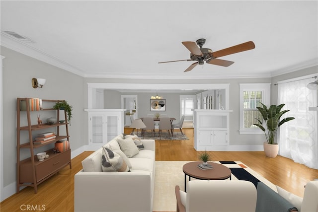 310 Hermosa, Long Beach, CA 90802 - living room featuring crown molding, light wood-type flooring, and a ceiling fan