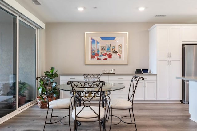 2896 Via Alta Pl, San Diego, CA 92108 - dining area with light wood-style flooring and recessed lighting