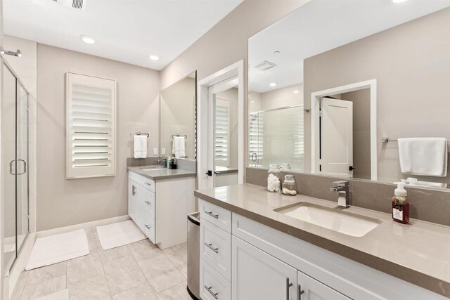 2896 Via Alta Pl, San Diego, CA 92108 - bathroom with a shower stall, two vanities, and recessed lighting