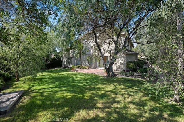 2207 Inverness Ct, Oxnard, CA 93036 - view of grassy yard featuring a patio area