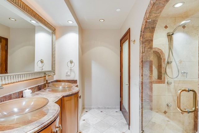 200 Harbor Dr Unit 1502, San Diego, CA 92101 - full bath with a shower stall, double vanity, recessed lighting, tile patterned flooring, and baseboards