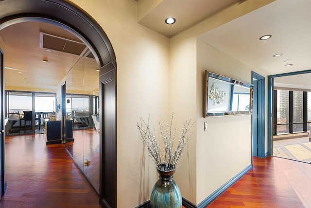 200 Harbor Dr Unit 1502, San Diego, CA 92101 - corridor featuring wood finished floors, healthy amount of natural light, arched walkways, and recessed lighting