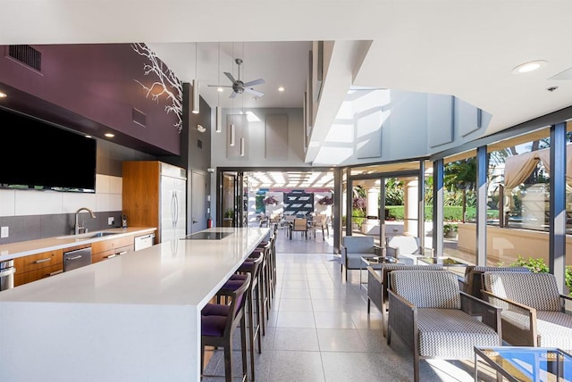 200 Harbor Dr Unit 1502, San Diego, CA 92101 - kitchen featuring modern cabinets, dishwasher, built in fridge, a ceiling fan, and light countertops