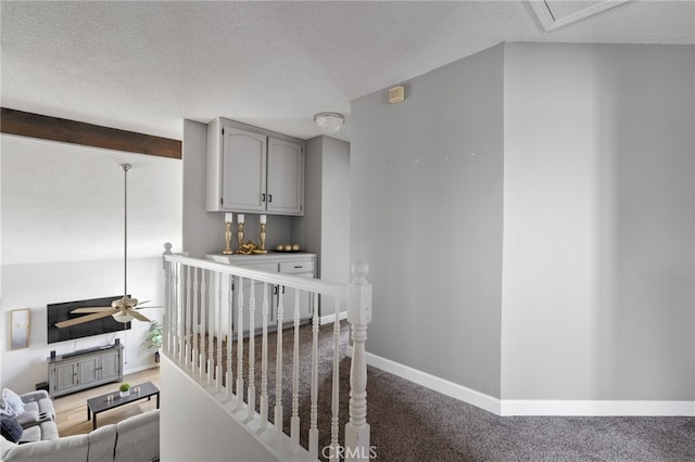 7209 Copper Creek Way, Bakersfield, CA 93308 - stairs featuring a textured ceiling, baseboards, ceiling fan, and carpet