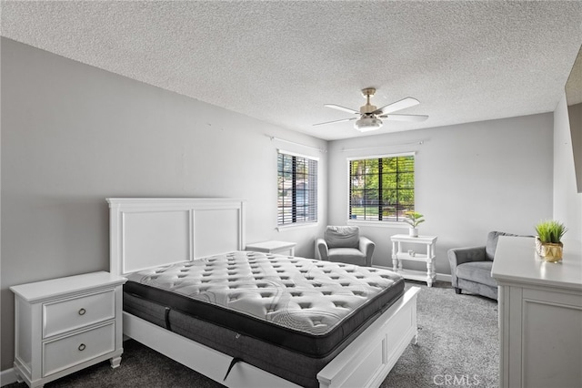 7209 Copper Creek Way, Bakersfield, CA 93308 - bedroom with dark carpet, a textured ceiling, baseboards, and a ceiling fan