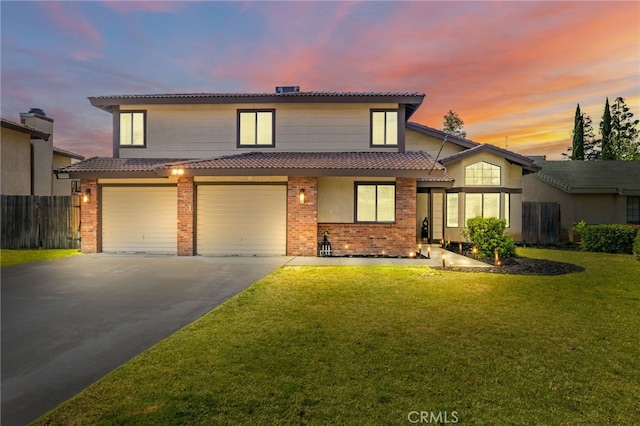 7209 Copper Creek Way, Bakersfield, CA 93308 - traditional-style home featuring driveway, brick siding, a tiled roof, and an attached garage