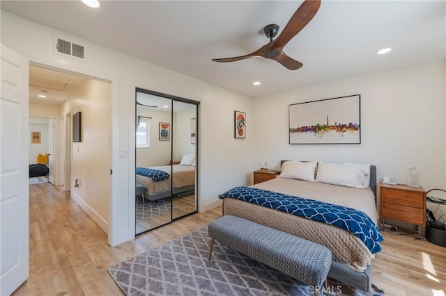 17392 Almelo Ln, Huntington Beach, CA 92649 - bedroom featuring a closet, light wood finished floors, a ceiling fan, recessed lighting, and baseboards