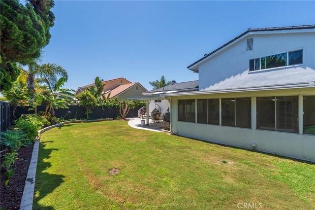 17392 Almelo Ln, Huntington Beach, CA 92649 - view of yard featuring a sunroom
