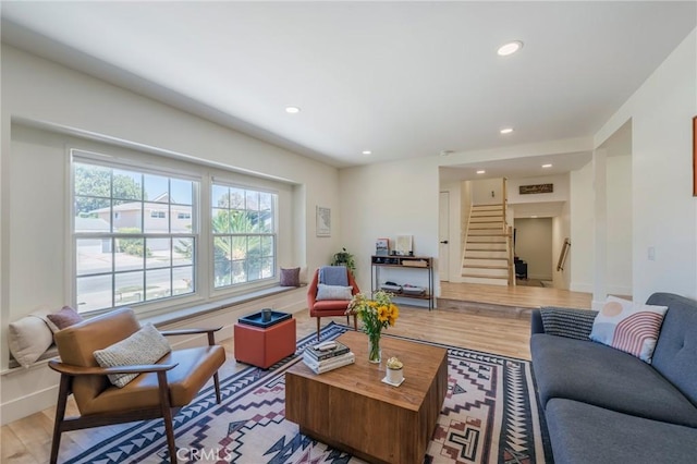 17392 Almelo Ln, Huntington Beach, CA 92649 - living room with stairs, wood finished floors, recessed lighting, and baseboards