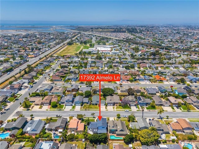 17392 Almelo Ln, Huntington Beach, CA 92649 - aerial view of property's location with nearby suburban area