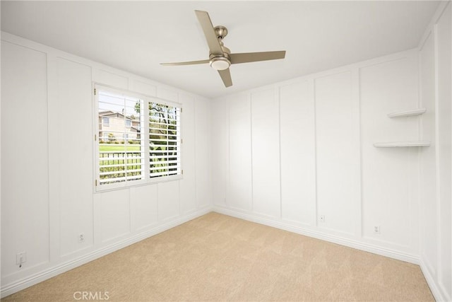 10108 Marchant Ave, Tustin, CA 92782 - empty room with a decorative wall, a ceiling fan, and light carpet