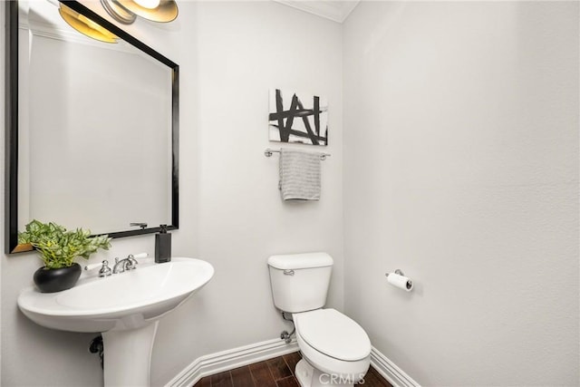 10108 Marchant Ave, Tustin, CA 92782 - bathroom featuring baseboards, wood finished floors, and toilet
