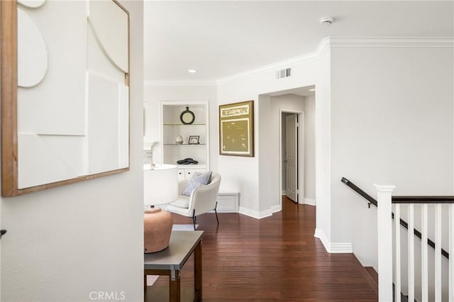 10108 Marchant Ave, Tustin, CA 92782 - hallway featuring wood finished floors, crown molding, built in features, baseboards, and an upstairs landing