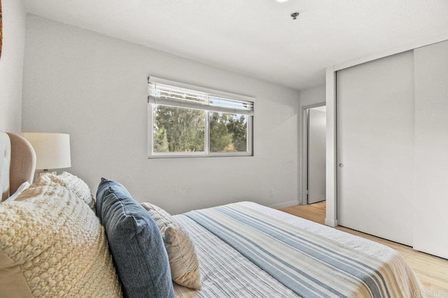 5377 Lake Murray Blvd, La Mesa, CA 91942 - bedroom featuring light wood finished floors and a closet