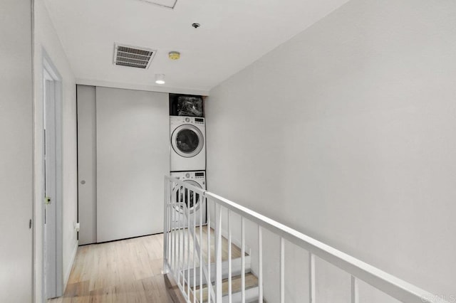 5377 Lake Murray Blvd, La Mesa, CA 91942 - hall with estacked washer and dryer and wood finished floors