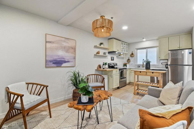 5377 Lake Murray Blvd, La Mesa, CA 91942 - kitchen with stainless steel appliances, light wood finished floors, under cabinet range hood, light countertops, and recessed lighting