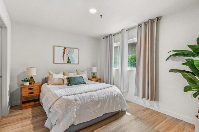 5377 Lake Murray Blvd, La Mesa, CA 91942 - bedroom with light wood-type flooring and baseboards