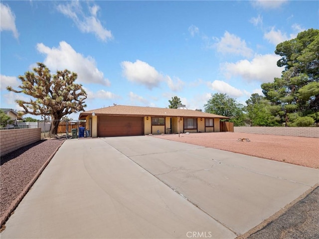 20654 Ottawa Rd, Apple Valley, CA 92308 - ranch-style house with an attached garage and driveway