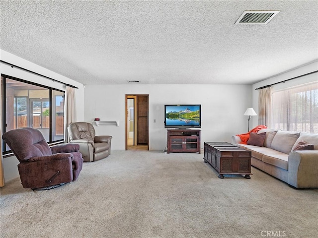 20654 Ottawa Rd, Apple Valley, CA 92308 - carpeted living room featuring a textured ceiling
