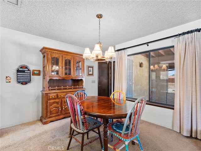 20654 Ottawa Rd, Apple Valley, CA 92308 - dining room with a chandelier, light colored carpet, and a textured ceiling